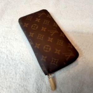 Louis Vuitton Large Monogram Zippy Wallet Brown Mahina